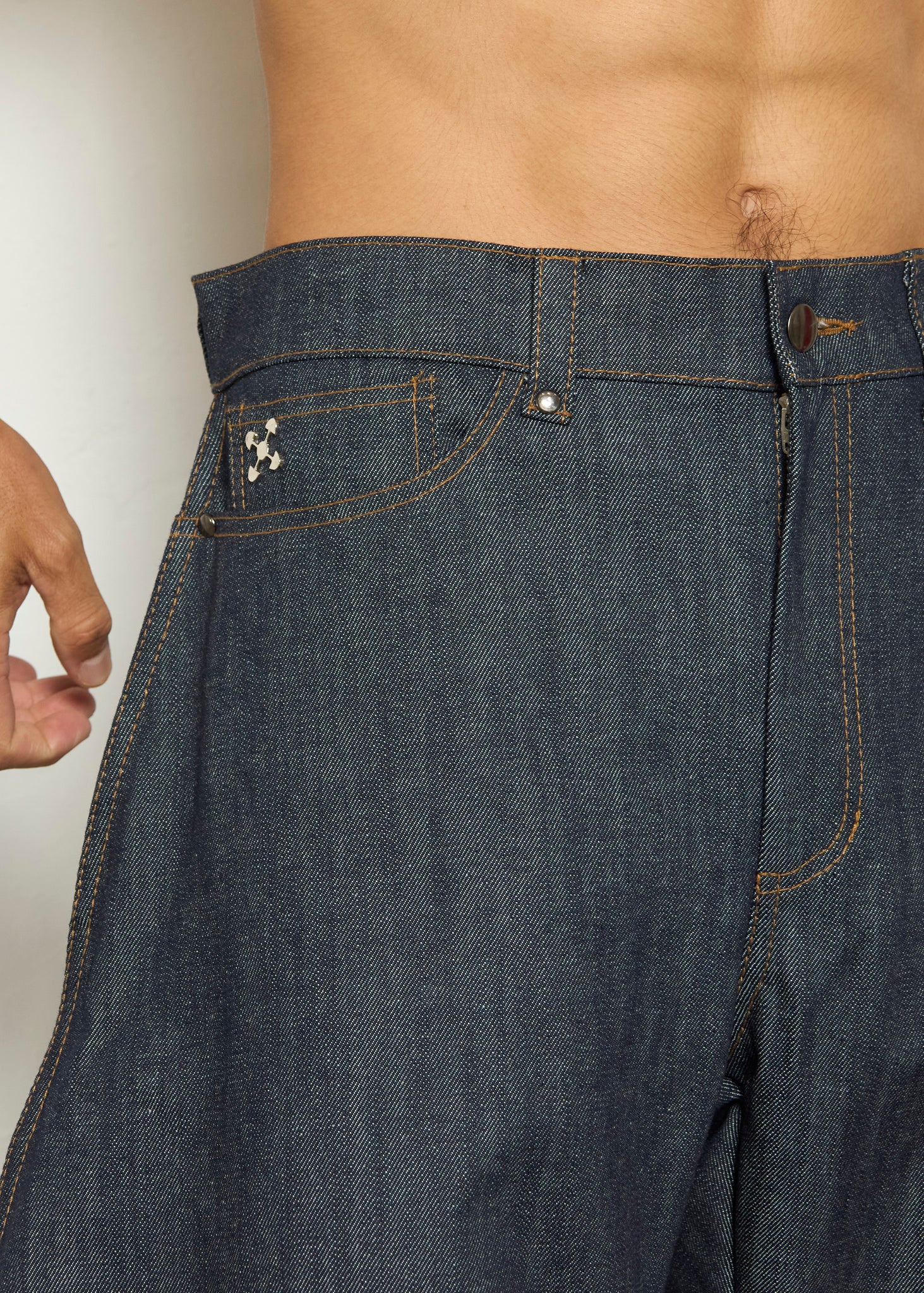 KADO CURVED DENIM PANTS